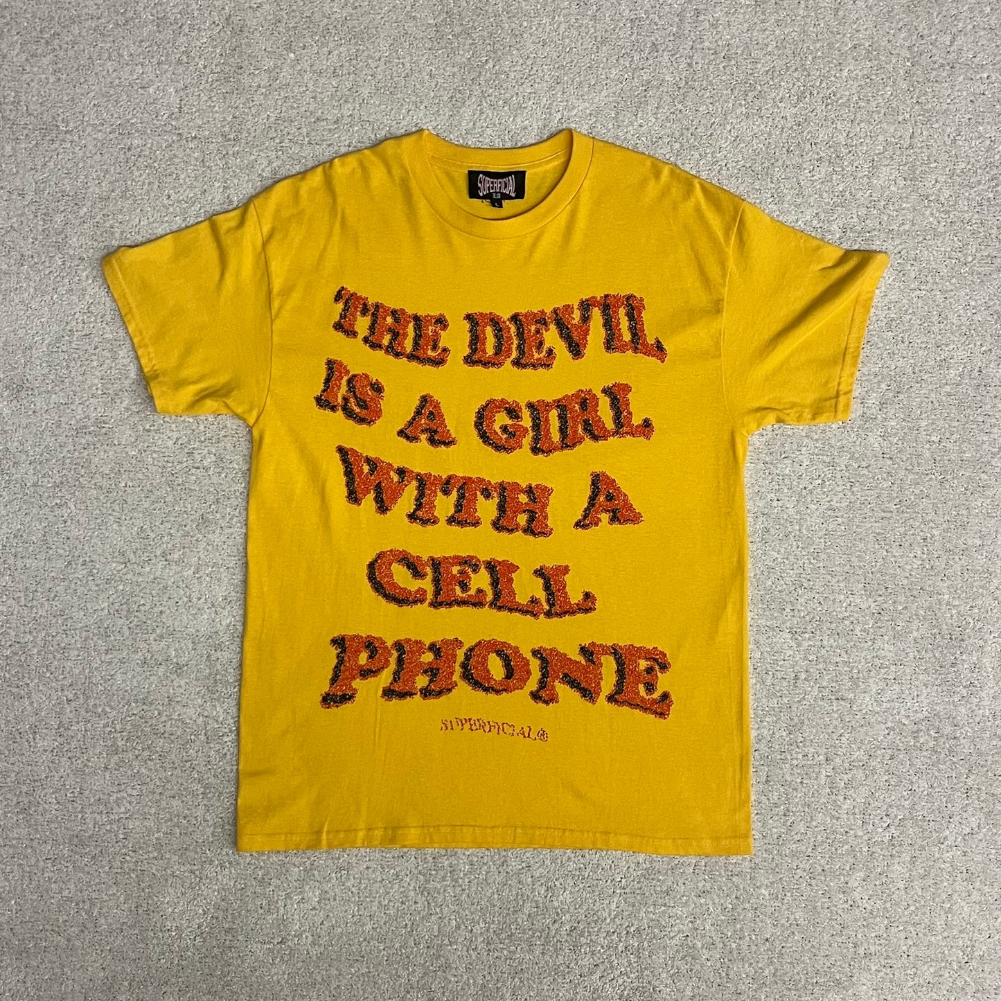 SUPERFICIAL THE DEVIL IS A GIRL WITH A CELL PHONE TEE 'YELLOW'